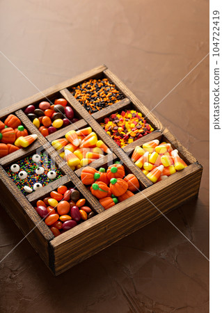 Halloween candy in a wooden box 104722419