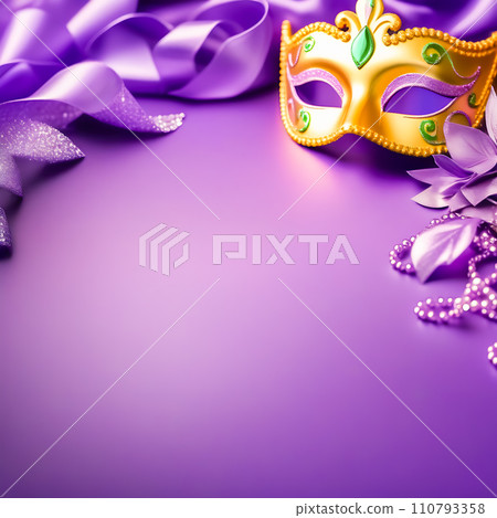 Close-up of the carnival mask and beads for the festive Mardi Gras masquerade on a purple background. A Fat Tuesday carnival with a traditional decor a place for text at the bottom 110793358