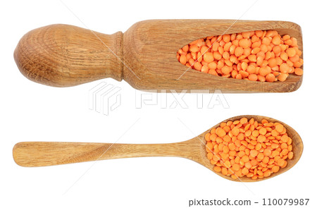 red lentil in wooden spoon isolated on white background. Top view 110079987