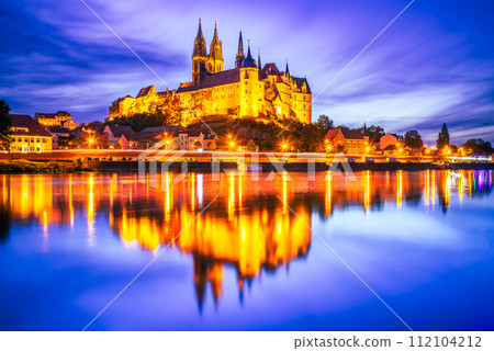 Meissen, Germany. Twilight blue sky, Albrechtsburg castle and cathedral on the River Elbe, Saxony. 112104212