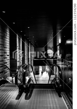 A monochrome world. Entrance of a building in a big city. 112354290