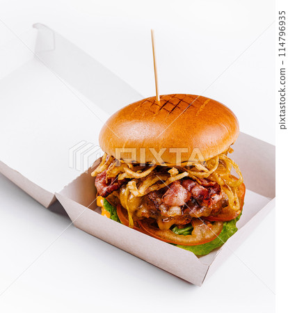 Gourmet burger in takeout box on white background 114796935