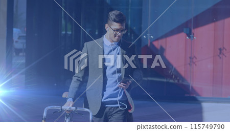 Image of light spots over biracial businessman using smartphone 115749790