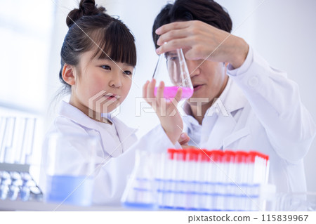 Elementary school girl and teacher studying science 115839967