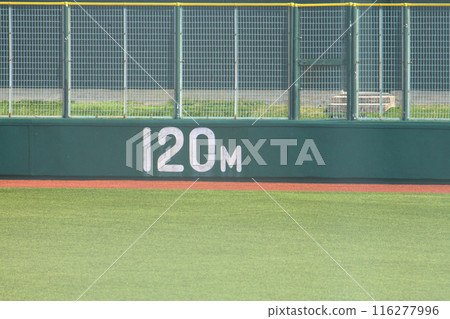 Distance markers on the outfield fence 116277996