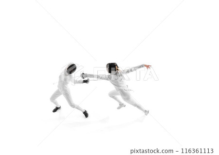 Fencing partners spar in controlled practice, each working to enhance their strategy and execution against white studio background. 116361113