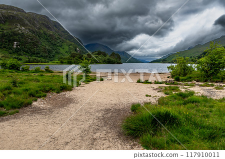 Sandy Beach Of Lake Loch Shiel At Glenfinnan Monument On The Road To The Isles In Lochaber In Scotland, UK 117910011