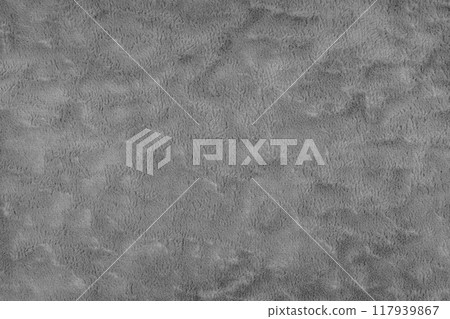 Texture of fluffy gray upholstery fabric or cloth. Texture of artificial fur textile material. 117939867