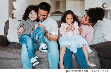 Mother, father and kids on sofa, playing and happy family bonding together in living room. Smile, happiness and parents relax with young children on couch, playful and spending quality time in Mexico 118413411