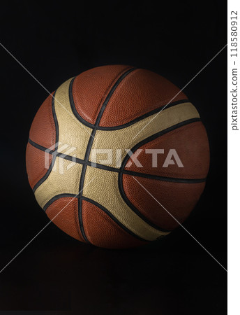 Basketball ball in minimalist style isolated on dark background. 118580912