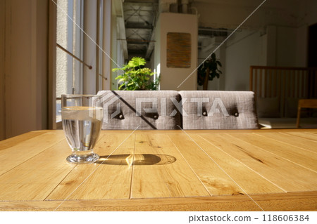 Cafe table, sofa and water 118606384