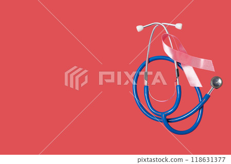 Stethoscope with pink ribbon on pink background 118631377