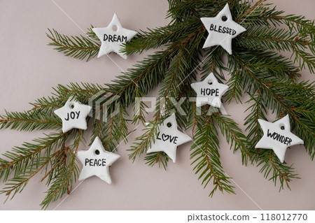 Christmas star with words RISEN BLESSED HOPE JOY PEACE DREAM LOVE WONDER Do it yourself air dry clay crafts for Christmas tree decoration holiday. Decoration gift idea Handmade children craft. Step by 118012770