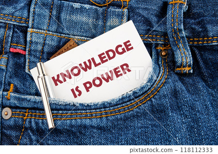 KNOWLEDGE IS POWER words on white card that appeared from the pocket of his jeans 118112333