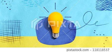 Yellow light bulb with handwritten sketch 118118537