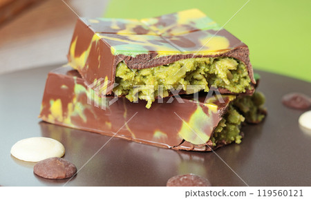 Dubai chocolate bar with pistachio paste and kataifi dough. Confectionery and sweets. 119560121