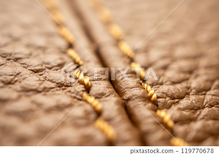 luxury brown leather bag texture background with stitching 119770678