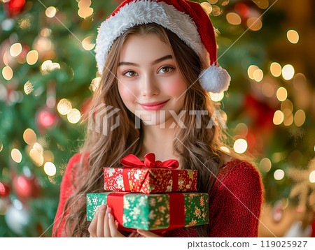 Santa girl with christmas gift 119025927