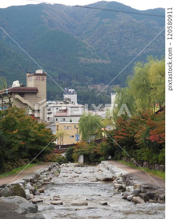 River flowing through hot spring town 120580911