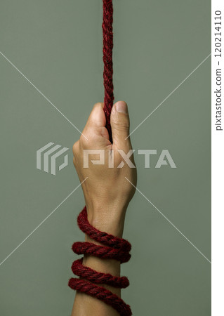 pulls a red rope depicting the struggle against aids 120214110