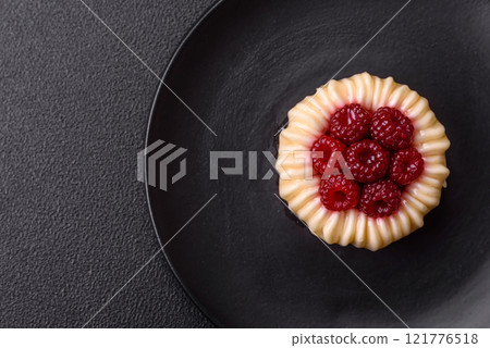 Sweet mousse tart with raspberries and filling 121776518