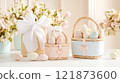 Pastel baskets hold colorful eggs, surrounded by spring flowers and soft light, creating a charming ambiance. 121873600