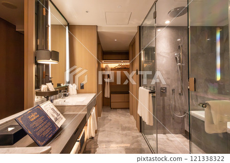 The beautiful bathroom sink in the guest room at Mesm Tokyo, a luxury hotel located in Waters Takeshiba near Hamamatsucho Station and Takeshiba Station. 121338322