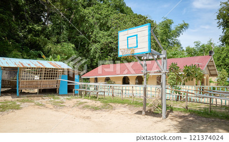 A basketball court in the sand on a small island in the Philippines. 121374024