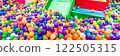 Exciting ball pit and slide combination for joyful indoor activities. 122505315