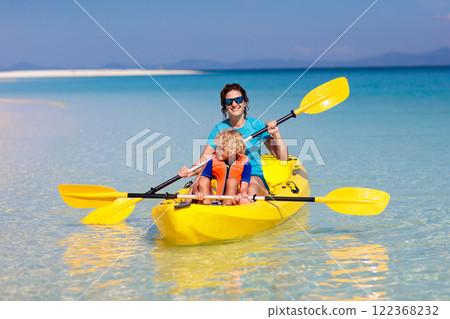 Kids kayaking in ocean. Family in kayak in tropical sea 122368232