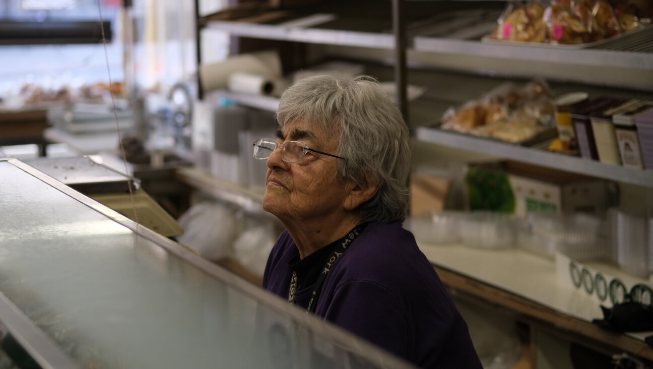 Schreiber, behind the counter at Moishe's Bakery.