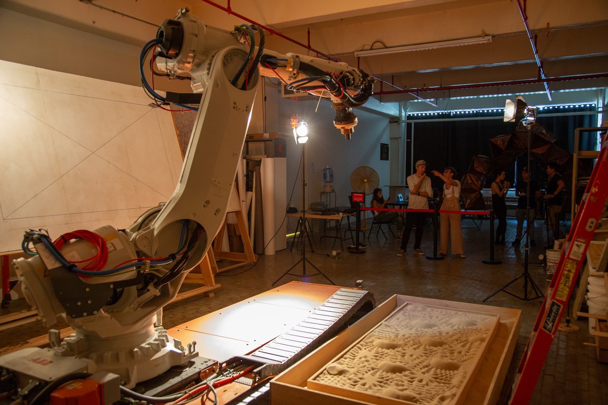 The team working with the robot arm
