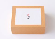 an open box with chinese writing on it