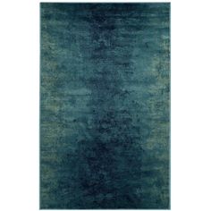 an area rug with dark blue and green colors on the carpet, it is very soft