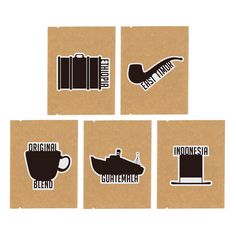 four pieces of cardboard with black and white stickers on them, each depicting different types of coffee