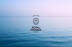 the royal phoenix logo is shown on an ocean surface with blue water