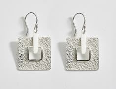 Graceful contemporary design in textured Sterling silver. Classy! Earring size hanging 1 3/8 inch. Gift boxed. Silver Clay Jewelry Ideas, Contemporary Silver Earrings, Metal Art Jewelry, Silver Necklace Simple, Mens Sterling Silver Necklace, Precious Metal Clay Jewelry, Handmade Silver Jewellery, Sterling Silver Cross Pendant, Silver Jewelry Earrings