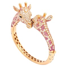 Bracelet giraffe red gold 555 diamonds 16.80 carats 217 pink sapphires 8.20 carats 2 black diamonds 0.49 carats 4 onyx 0.43 carat. Luxury Pink Jewelry With Natural Stones, Luxury Pink Gold Bracelets As A Gift, Luxury Pink Gemstone Jewelry, Luxury Pink Sapphire Fine Jewelry Bracelet, Luxury Pink Sapphire Bracelets, Luxury Pink Diamond Bracelet As Gift, Luxury Pink Diamond Bracelet, Giraffe Ring, Giraffe Jewelry