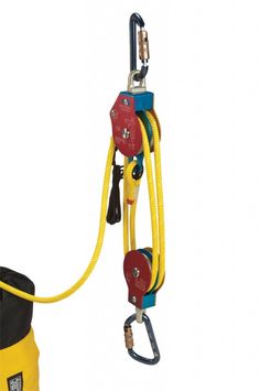 a yellow and black device attached to a rope