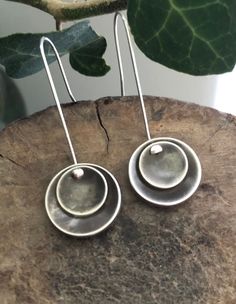 Pretty Sterling Silver Disc Earrings. These oxidised sterling silver disc earrings are simple but striking Handmade from sterling silver they are substantial but lightweight to wear. They hang on the simplest of hooks to compliment their beautiful minimalist look. MATERIAL - Sterling Silver FINISH - Oxidised GIFTS - I'm happy to post items directly to your gift recipient and can include a hand written note, just let me know in the 'Notes To Seller' section when purchasing. PROCESSING TIME - I tr Earrings Oxidised, Simple Silver Earrings, Handmade Silver Jewellery, Earring Silver, Disc Earrings, Jewellery Handmade, Metal Words, Oxidised Jewellery, Silver Jewelry Handmade