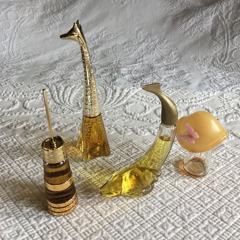 "Vintage Unique Avon Cologne Bottles. Listing is for 1 Bottle. Butter Churn Occur!, Mushroom Empty Sweet Honesty, Giraffe To a Wild Rose or Dolphin Sweet Honesty Cologne. Choose Your Collectible Avon Bottle, All are full except the mushroom which is empty: Butter Churn Full of Occur Cologne: 1 9/16\" X 6 1/2\", Mushroom with Butterfly Empty Bottle: 2 7/8\" X 2 3/4\" X 3 3/4\", Giraffe Bottle Full of To a Wild Rose Cologne: 1 7/8\" X 7 7/8\" Tall, Dolphin Full of Cologne: 4\" X 1 3/8\" X 6 3/8\" Cologne Bottles, Sweet Honesty, Avon Perfume Bottles, Butter Churn, Avon Collectibles, Avon Perfume, Churning Butter, Mini Perfume, Perfume Lover