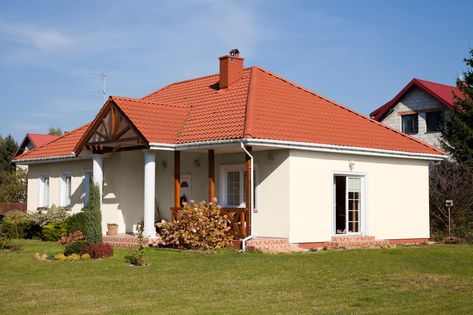 Houses with warm red roofs are popular for classic, rustic, farmhouse, country, Spanish, or modern aesthetics. But you're probably stumped on what col... | 10 Lily of the Valley Red Roof House Colors, Shutter Paint Colors, Buying A New House, Red Roof House, Tan House, Paint House, Green Shutters, Outside Paint, Red Brick House