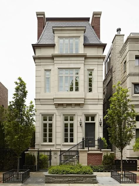 French limestone three story home boasts a black front door as well as a gray… French Home Exterior, Mansard Roof, Casa Country, Villa Plan, University Campus, French House, Facade House, French Country Decorating, Victorian Homes