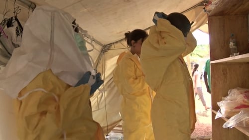 Guinea's government raised the death toll in the Ebola epidemic raging through its southern forests and capital to 95