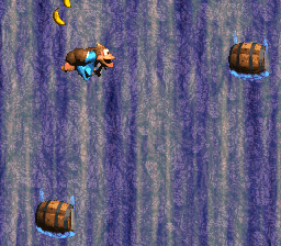 Kiddy Kong scales a waterfall at Barrel Drop Bounce.