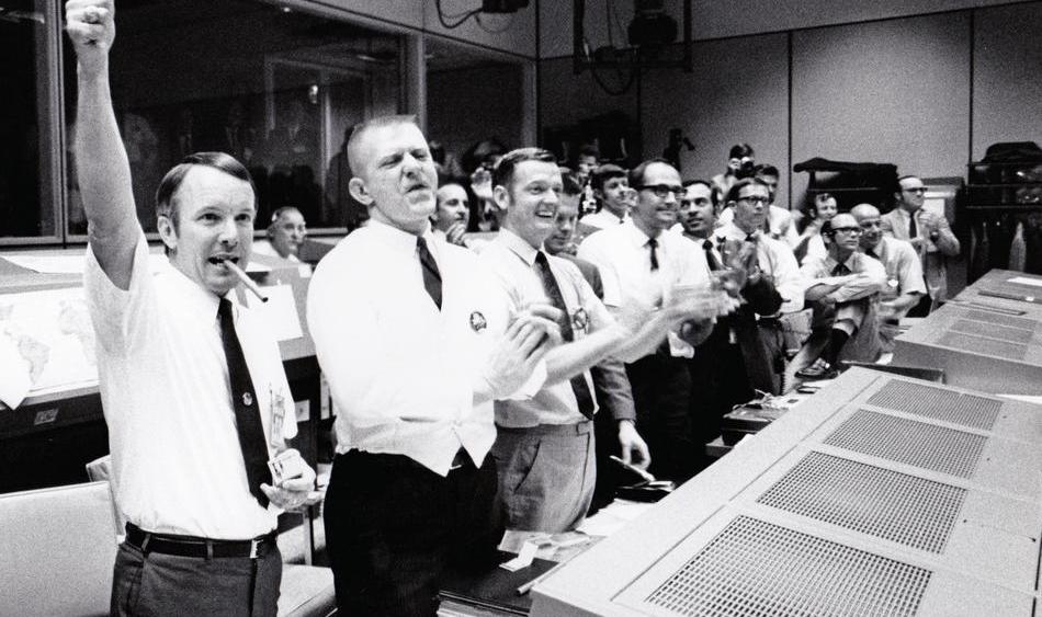 From left to right: Chris Kraft, Gene Kranz, Glynn Lunney, Gerry Griffin, John Aaron, Ed Fendell, Jerry Bostick, Jim Lovell, Gene Cernan, Charlie Duke, Steve Bales.