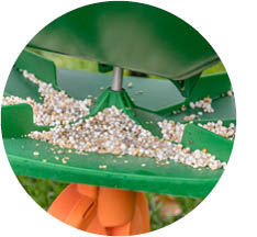 closeup image of a fertilizer spreader