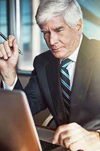 man looking at computer