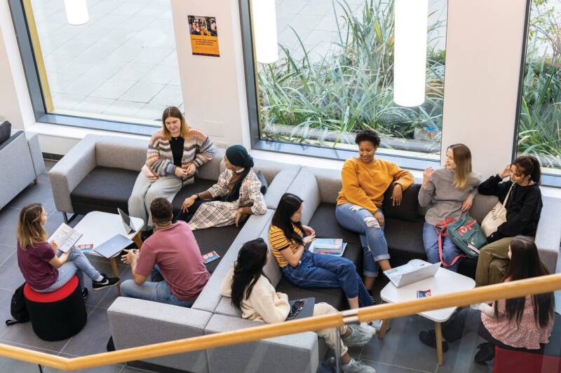 Student sitting on sofas