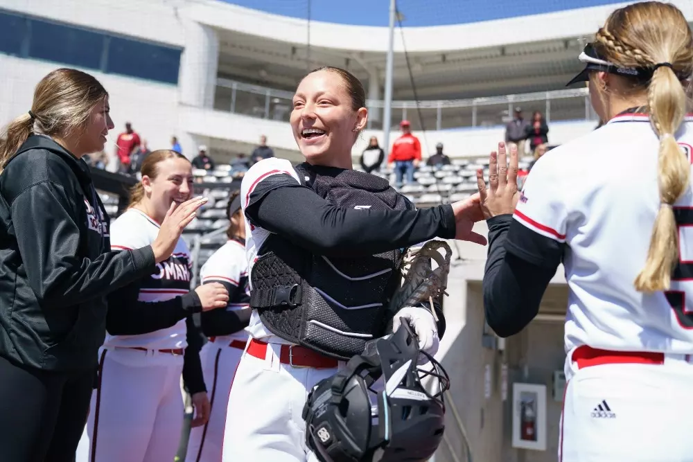 Softball team high five